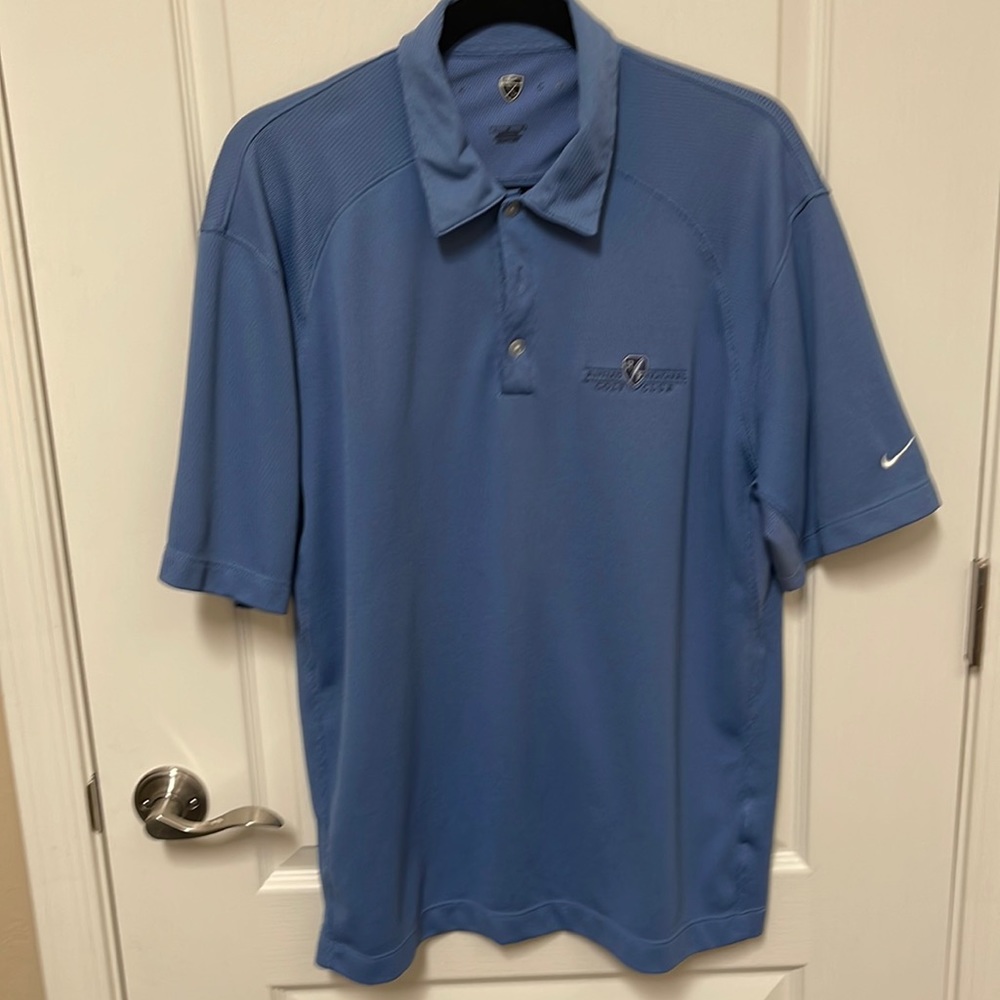Men’s blue Nike, golf shirt, size large.
